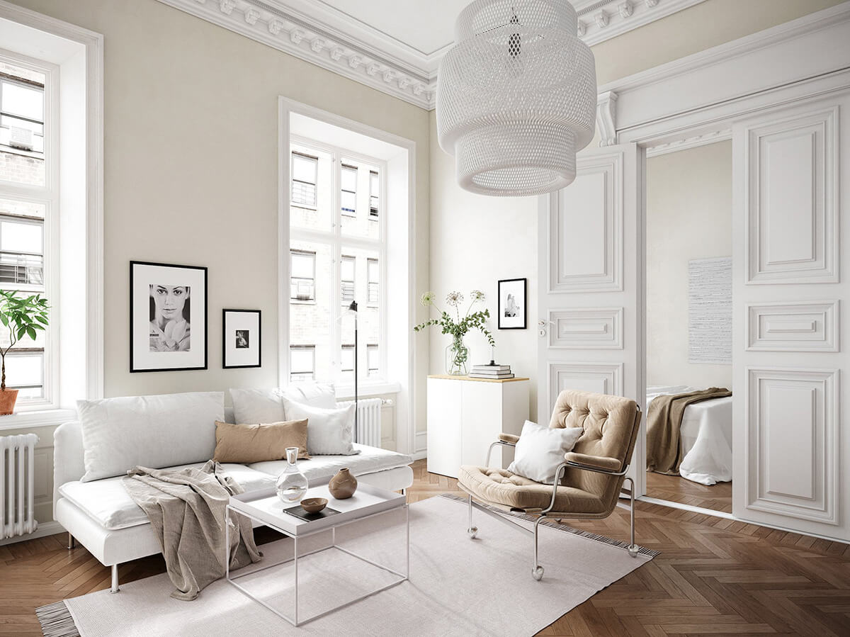 Kuchnia w stylu francuskim: Białe fronty, marmurowy blat i wyrafinowane akcesoria.