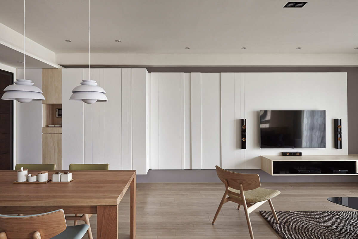 Minimalizm w Salonie Nowoczesny salon z minimalistycznym wystrojem i funkcjonalnymi meblami do małego mieszkania.