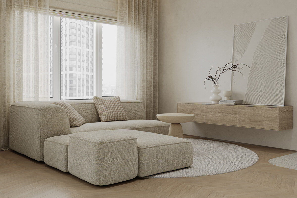 Kremowa ściana i sofa tworzą przytulną atmosferę w salonie.