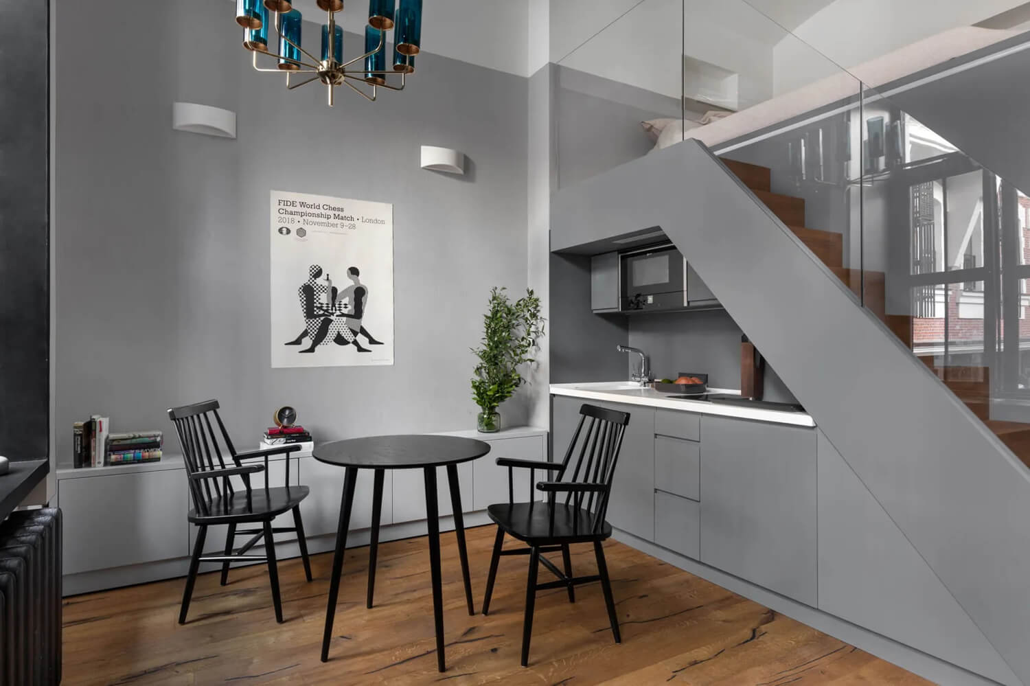 Design dwupokojowego mieszkania: stylowa kuchnia z barem w nowoczesnym stylu w 2026