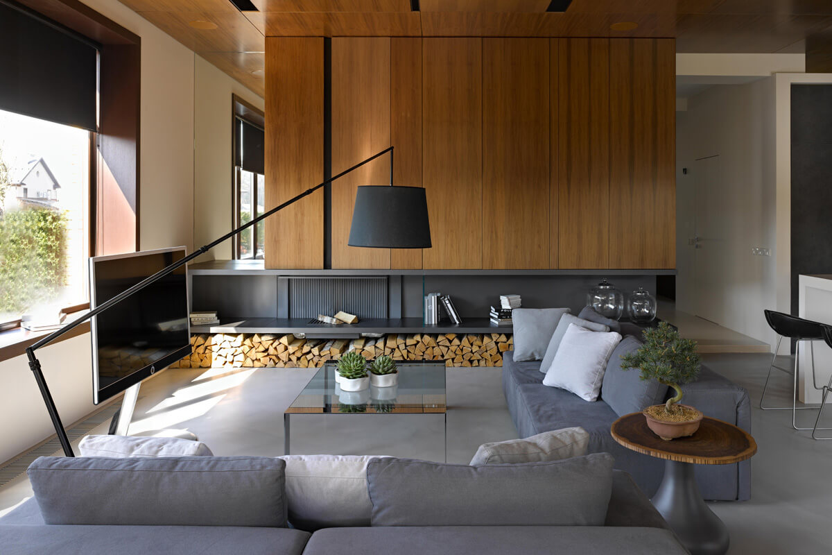 Kuchnia z salonem w domu z wyspą i nowoczesnym oświetleniem, 2026