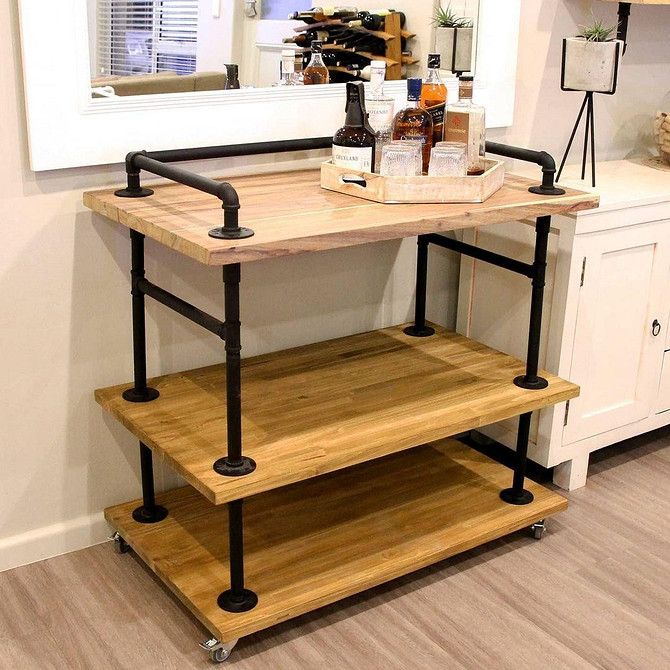 Designerski regał z rur hydraulicznych na książki i dekoracje w stylu loft