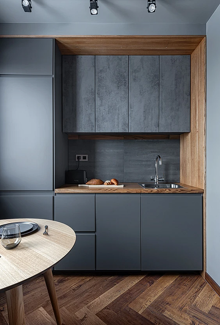 Organizacja przestrzeni w małym mieszkaniu z wielofunkcyjnymi meblami i pionowym przechowywaniem 2026.