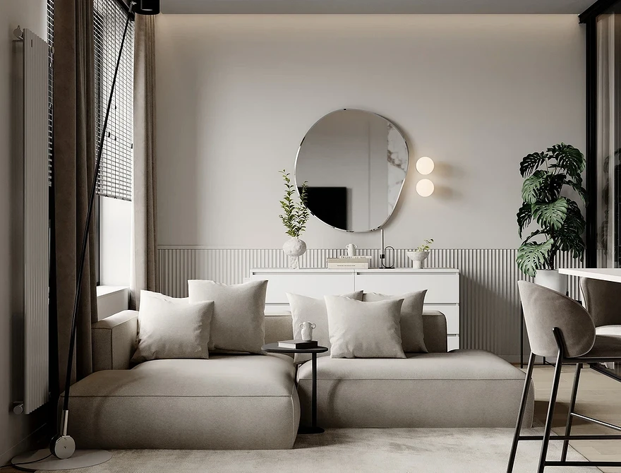Nowoczesna biała skórzana sofa Nowoczesne wnętrze z białą skórzaną sofą na metalowych nogach i kolorowymi akcentami.