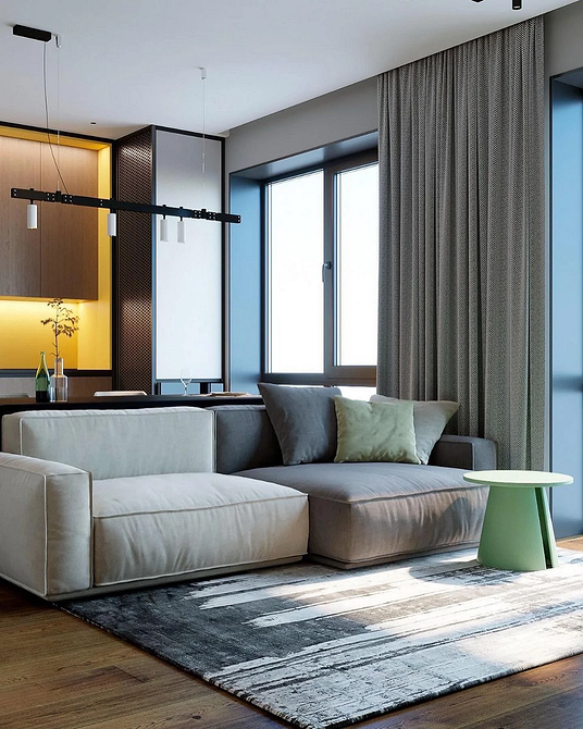 Praktyczna tkanina na sofie Praktyczna sofa z łatwą w pielęgnacji tkaniną obiciową w minimalistycznym salonie.