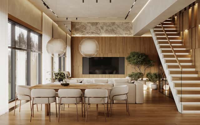 Projektowanie wnętrz domów 2026: Eleganckie połączenie komfortu i naturalnych elementów w salonie.