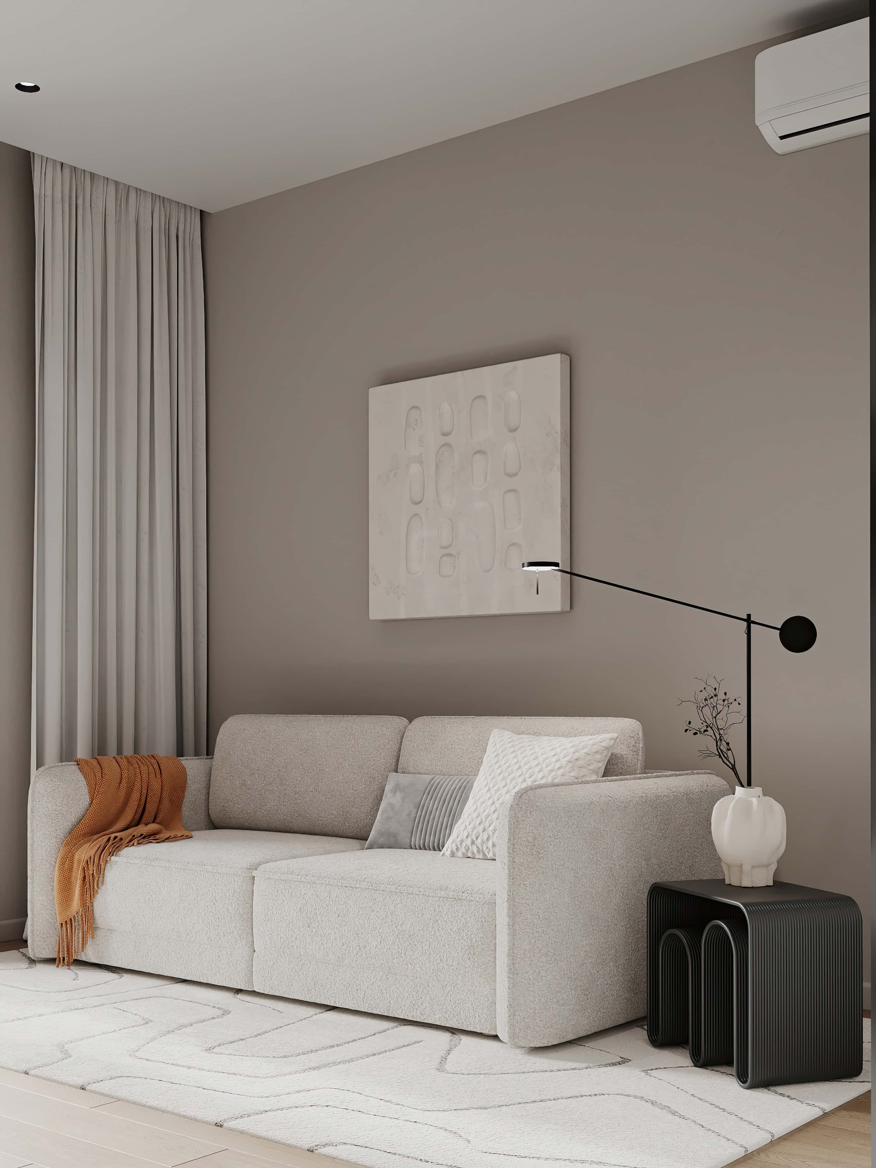 Jasny salon w stylu skandynawskim z elementami drewna i minimalistycznym wystrojem.