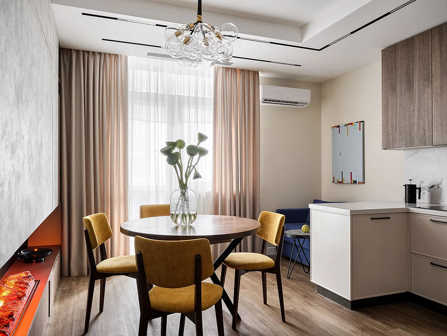 Przytulna aranżacja Przytulna kuchnia z salonem: pomysły na strefowanie i rozstawienie mebli.