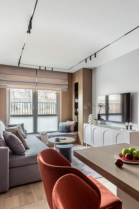 Ergonomia w kuchni Ergonomiczna aranżacja kuchni z salonem: meble dla wygodnego użytkowania.