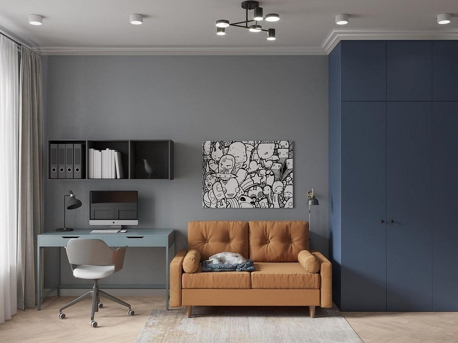 Brązowa sofa welurowa z dywanem w tym samym odcieniu. Ciepłe kolory do salonu.