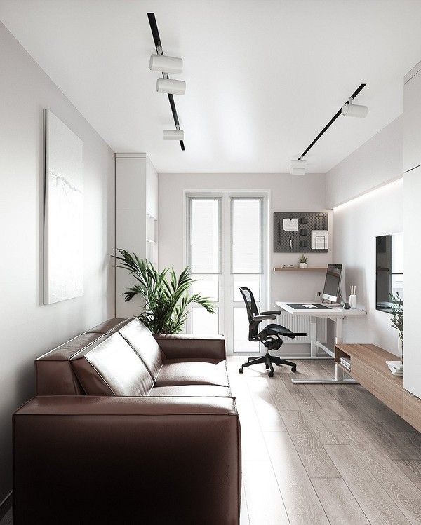 Przytulna, narożna, brązowa sofa w salonie z dekoracyjnymi poduszkami. Idealne miejsce do relaksu.