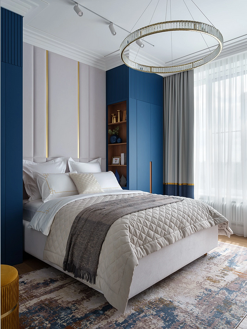 Trendy łóżka 2026: łóżko z wysokim wezgłowiem i geometrycznym wzorem w sypialni.