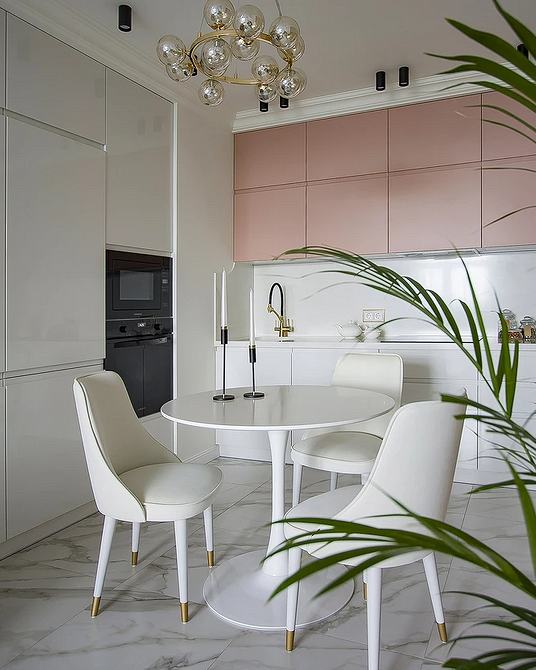 Nowoczesny okrągły stół z metalowymi nogami - przegląd designu stołów.