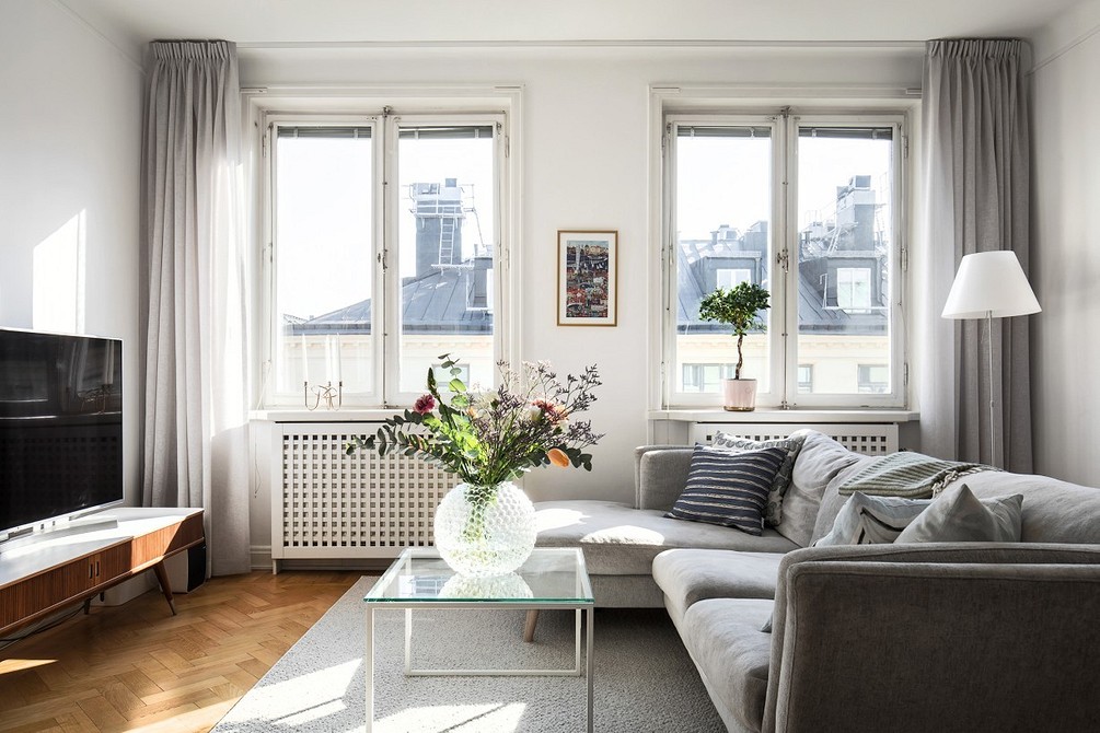 Nowoczesny дизайн интер'єру: Stylowy szary pokój z akcentem na detalach.