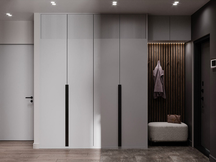 Szara kuchnia z białym blatem i drewnianymi akcentami w stylu skandynawskim 2026.