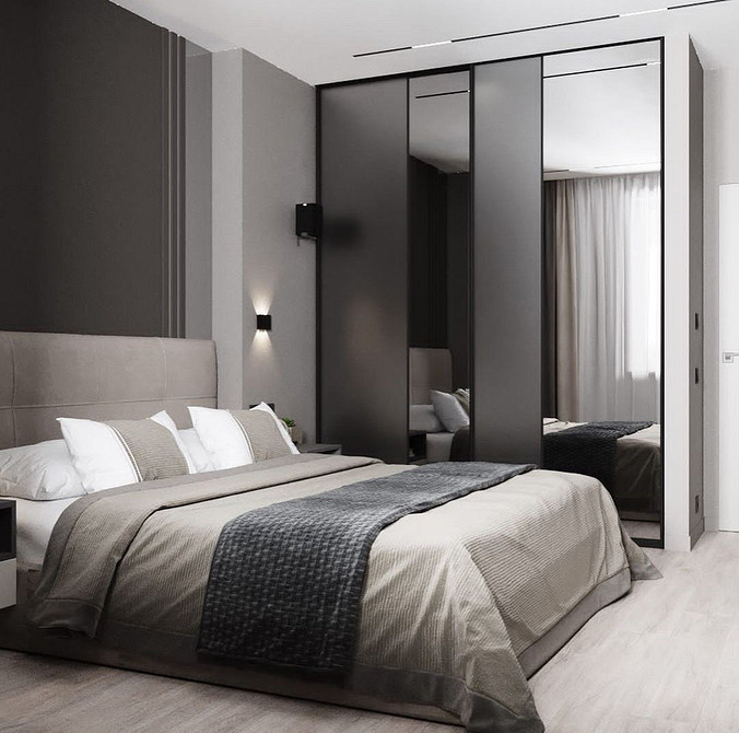 Minimalistyczna szafa Jasna szafa przesuwna w minimalistycznej sypialni, funkcjonalność i oszczędny design.