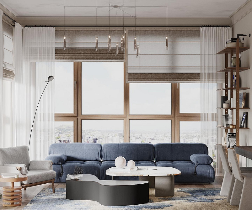 Kolorowe poduszki na niebieskiej sofie. Aranżacje salonu 2026 w stylu nowoczesnym.