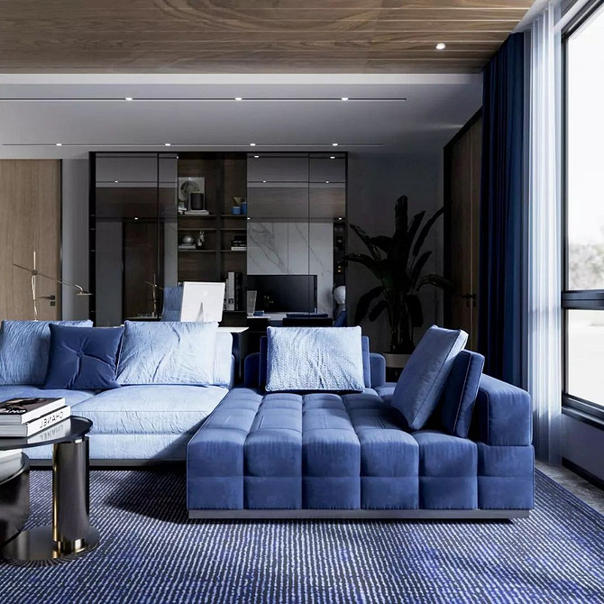 Minimalistyczna niebieska sofa w nowoczesnym salonie. Aranżacje 2026 w małym mieszkaniu.