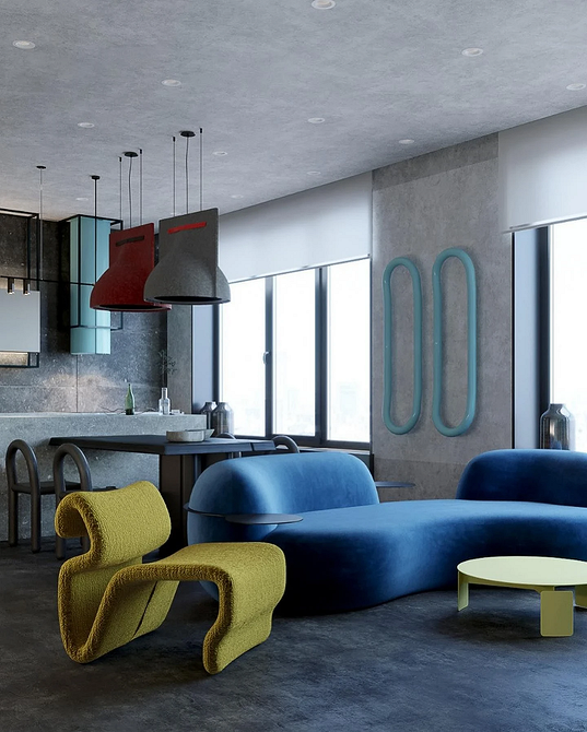 Aranżacja salonu z niebieską sofą i dodatkami w neutralnych kolorach.