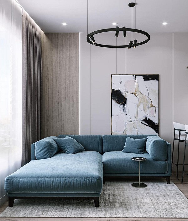 Niebieski design sofy Nowoczesna aranżacja wnętrz z niebieską sofą i dopasowanymi kolorami.