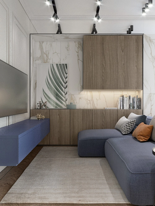 Niebieska sofa jako centralny element w nowoczesnym salonie 2026.