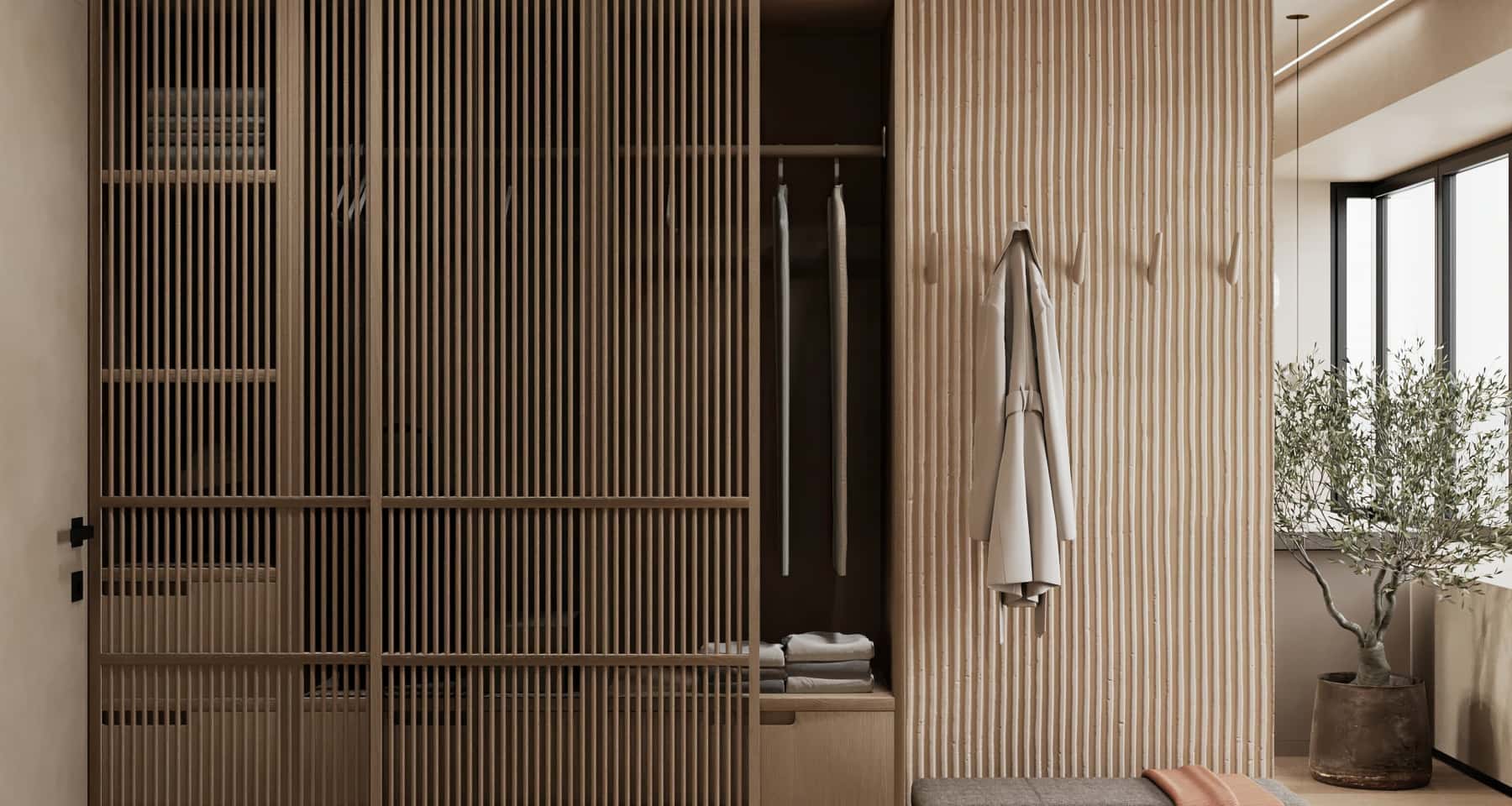 Sypialnia w stylu Japandi: niskie łóżko i spokojne odcienie kolorystyczne.