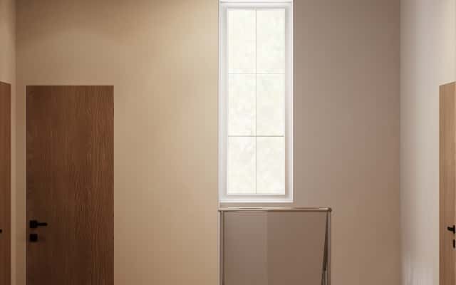 Nowoczesny dom w stylu minimalizmu: naturalne elementy tworzą ciepłą i przytulną atmosferę w salonie.