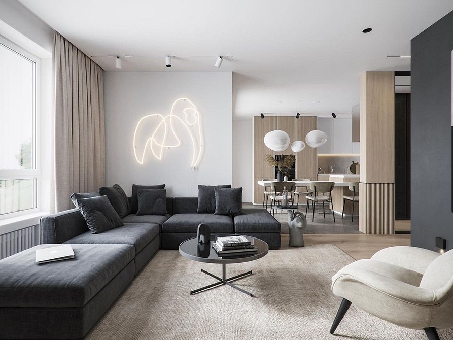 Minimalistyczny narożnik w salonie Minimalistyczny salon z narożnym sofą i stolikiem kawowym, podkreślający prostotę aranżacji.
