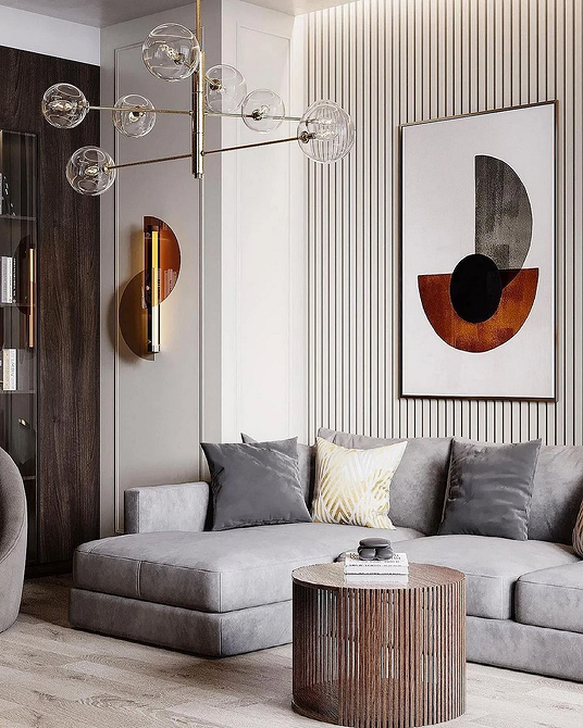 Przytulny narożnik loft Niebieski narożnik w stylu loft, tworzący przytulną atmosferę w aranżacji małego salonu.