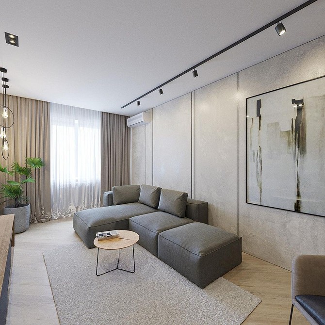 Tekstylny narożnik w stylu loft Narożna sofa z tekstylną tapicerką w minimalistycznej, nowoczesnej aranżacji salonu.