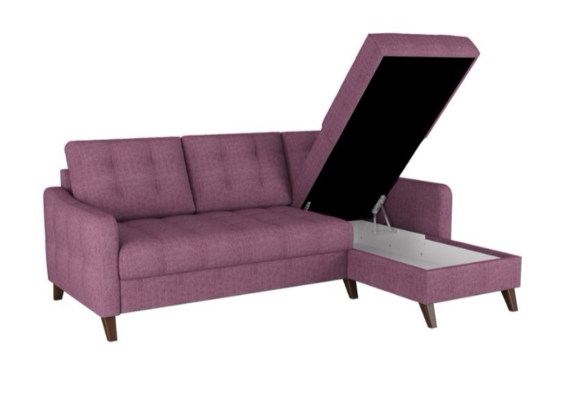 Sofa rozkładana z welurową tapicerką w salonie, idealna do małego mieszkania.