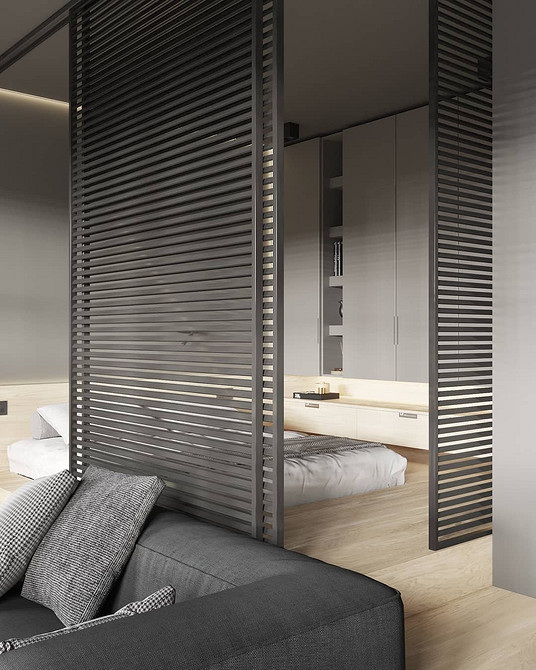 Funkcjonalne łóżko na podium z oświetleniem, idealne do strefowania przestrzeni.