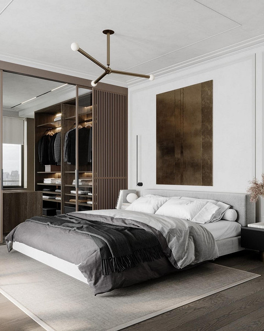 Minimalistyczna sypialnia z łóżkiem na podium i oszczędnymi formami mebli.