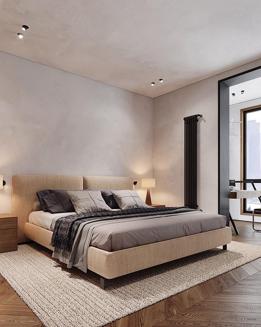 Mała sypialnia z łóżkiem na podium i maksymalnym wykorzystaniem przestrzeni.