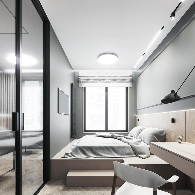 Nowoczesna sypialnia z łóżkiem na podium, minimalizm i ukryte schowki.