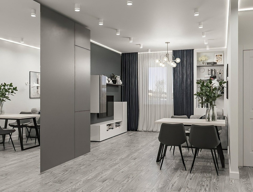 Nowoczesna szafa lustrzana w salonie: idealne rozwiązanie do przechowywania i designu.