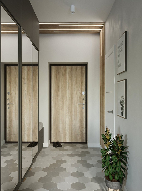 Szafa lustrzana z dekoracyjnymi elementami w klasycznym salonie. Szafy na wymiar.