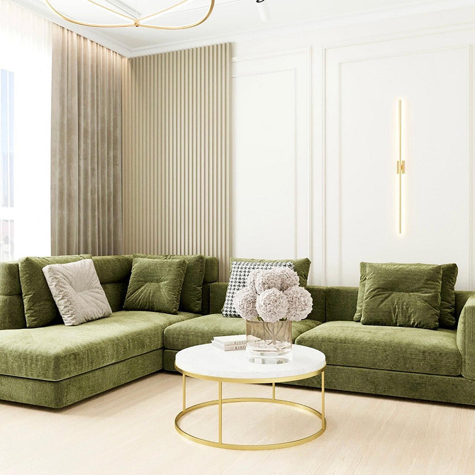 Skandynawski szyk Nowoczesny salon z zieloną kanapą, poduszkami i tekstyliami w stylu skandynawskim