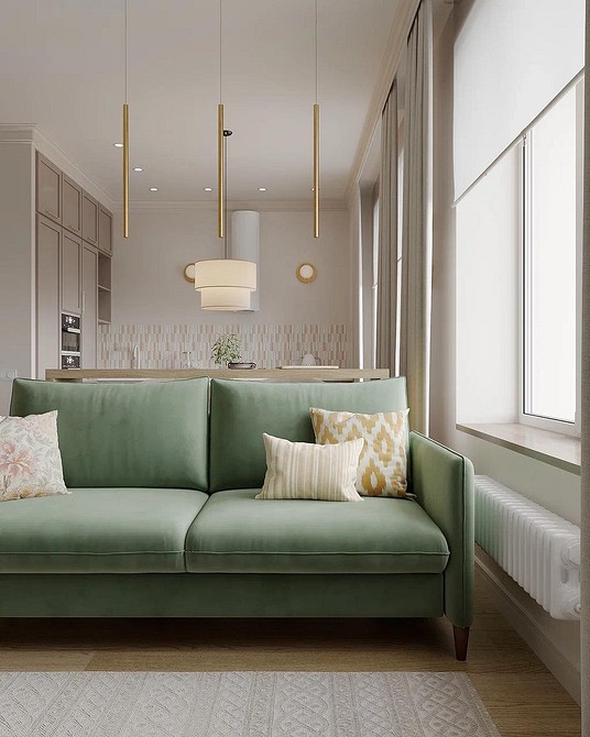 Zielona kanapa: styl Zielona kanapa w salonie z poduszkami i zasłonami. Inspiracje aranżacyjne.