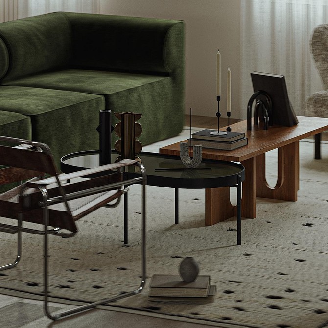 Ciemnozielona sofa w salonie z geometrycznym dywanem i nowoczesnym designem