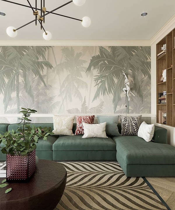 Klasyczny salon: zielona sofa, kominek i półki na książki.