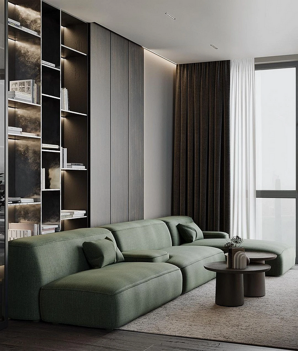 Elegancja w zieleni Elegancka zielona kanapa w połączeniu z poduszkami i zasłonami w podobnym odcieniu.