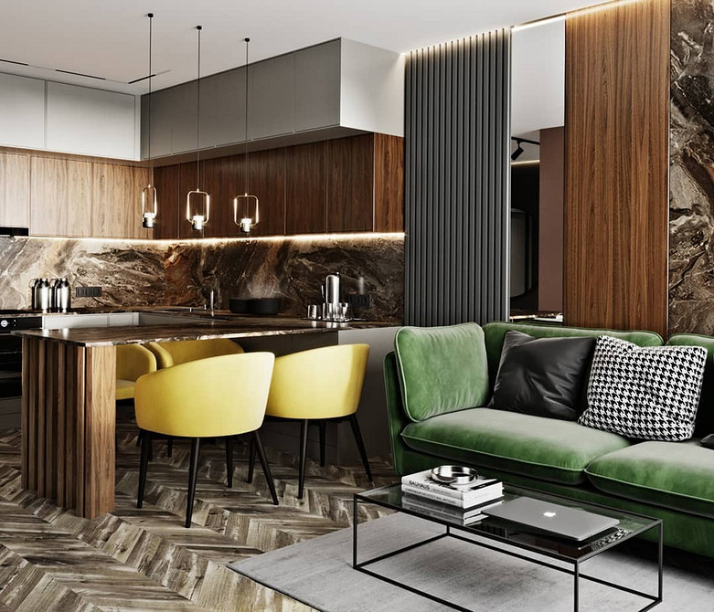 Komfortowa zieleń Komfortowa zielona kanapa w aranżacji z różnorodnymi tekstyliami i barwami.