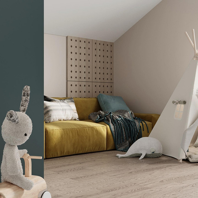 Żółta sofa w pokoju dziecka: jasny akcent do zabawy i odpoczynku.