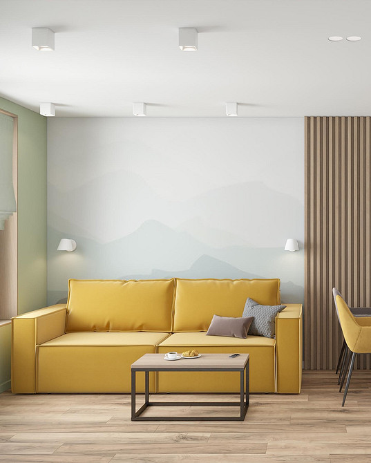 Żółta skórzana sofa w salonie: luksusowy i praktyczny wybór dla nowoczesnego wnętrza.