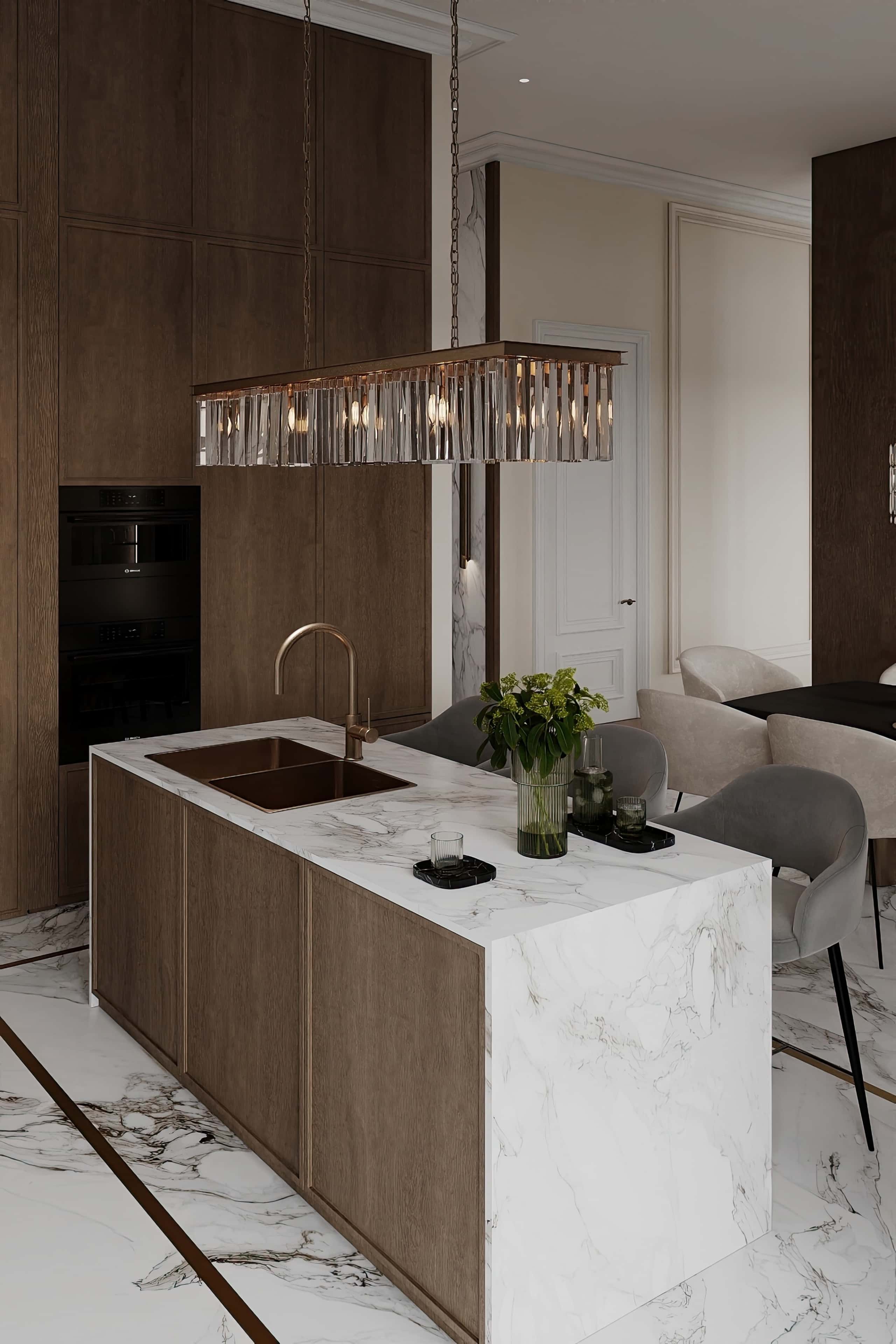 Jasna kuchnia z drewnianymi blatami dodającymi ciepła i przytulności wnętrzu.