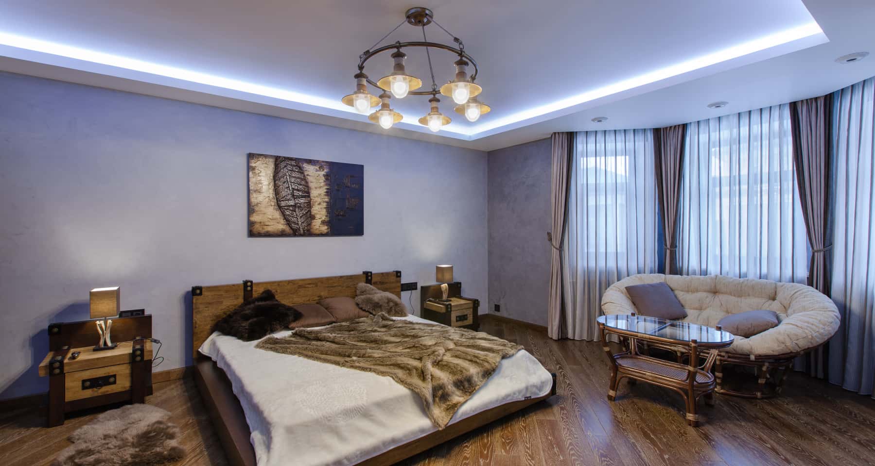 Ciemna jadalnia z masywnym drewnianym stołem i krzesłami, idealna na rok 2026