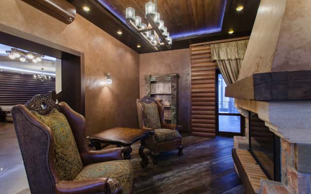 Nowoczesny design wnętrza w ciemnych tonach z minimalistycznym akcentem, projekt 2026.