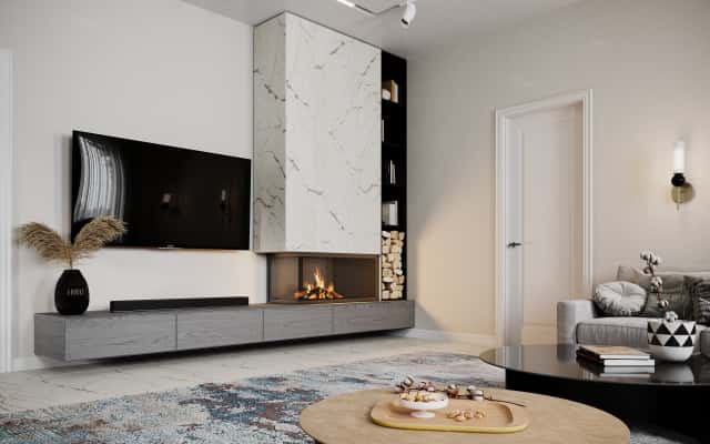 Przestronny hol w dwupiętrowym domu z nowoczesnymi schodami i oświetleniem