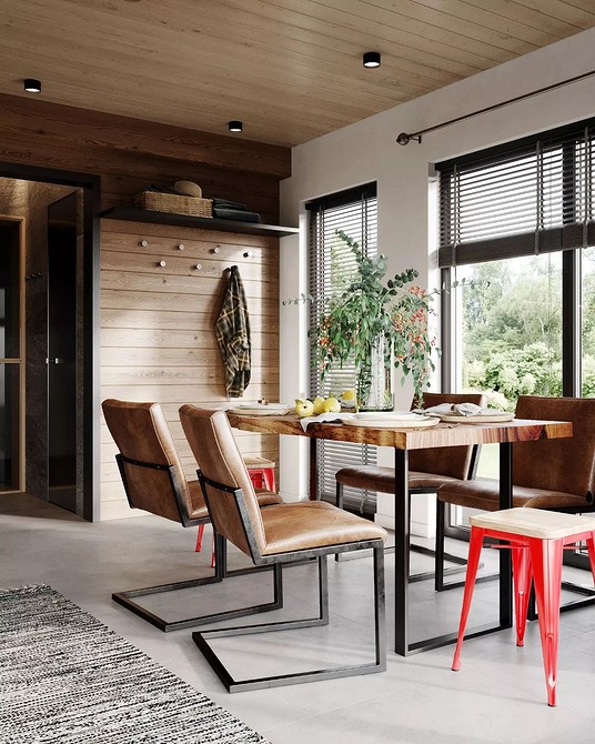 Klimat loft w małym wnętrzu Przytulna aranżacja małego pokoju relaksacyjnego w stylu loft z cegłą.